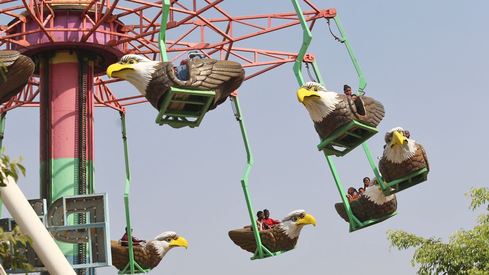 People on an amusement park ride in Abuja, Nigeria - Wednesday 10 April 2024