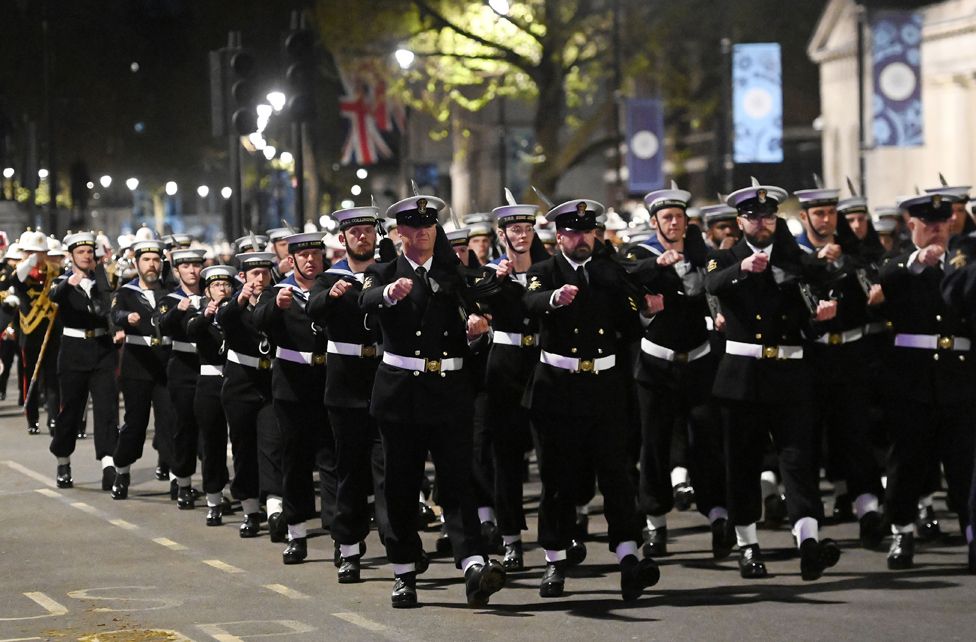 Royal Navy personnel march up Whitehall during the rehearsal for the Coronation in London.