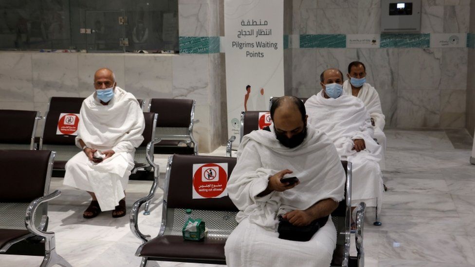 Muslims arrive at Al-Zaidi station to be taken to the Grand Mosque, ahead of the annual Haj pilgrimage, in the holy city of Mecca, Saudi Arabia