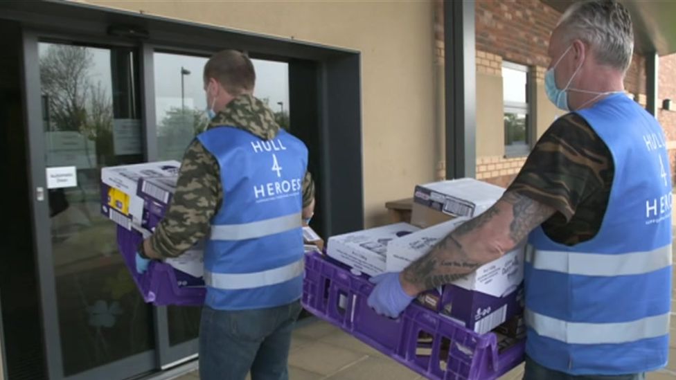 Staff delivering food parcels