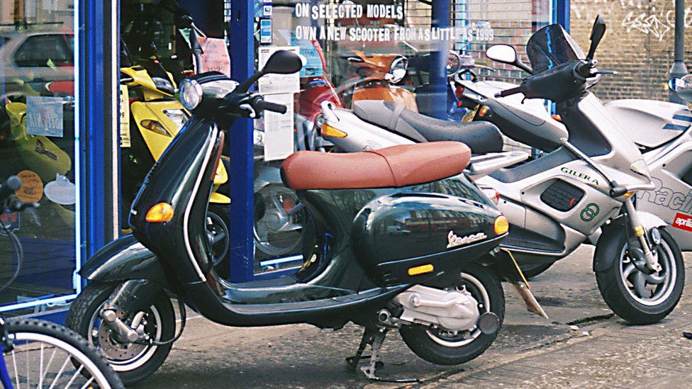 two mopeds.