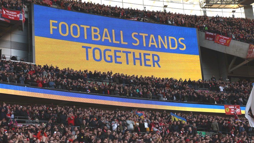 A message on the scoreboard at Wembley saying Football Stands Together in reference to the current hostilities in the Ukraine during the Carabao Cup Final match between Chelsea and Liverpool at Wembley Stadium on February 27