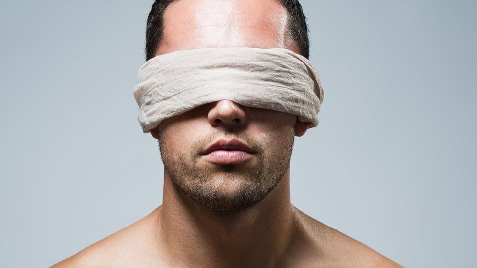 A man blindfolded