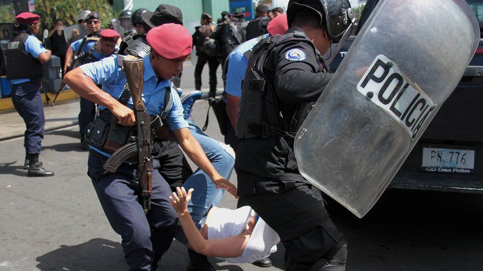 Nicaraguan riot police detain a protester demanding the government release opposition activists, in Managua on March 16, 2019