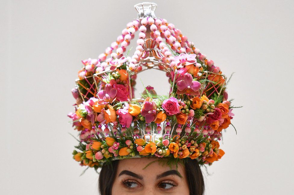 A model wears a flower crown by Dean Sharpe's Floral Studio