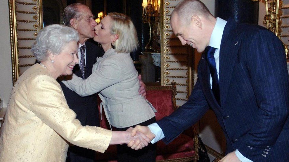 Mike Tindall shakes hands with the Queen in 2006