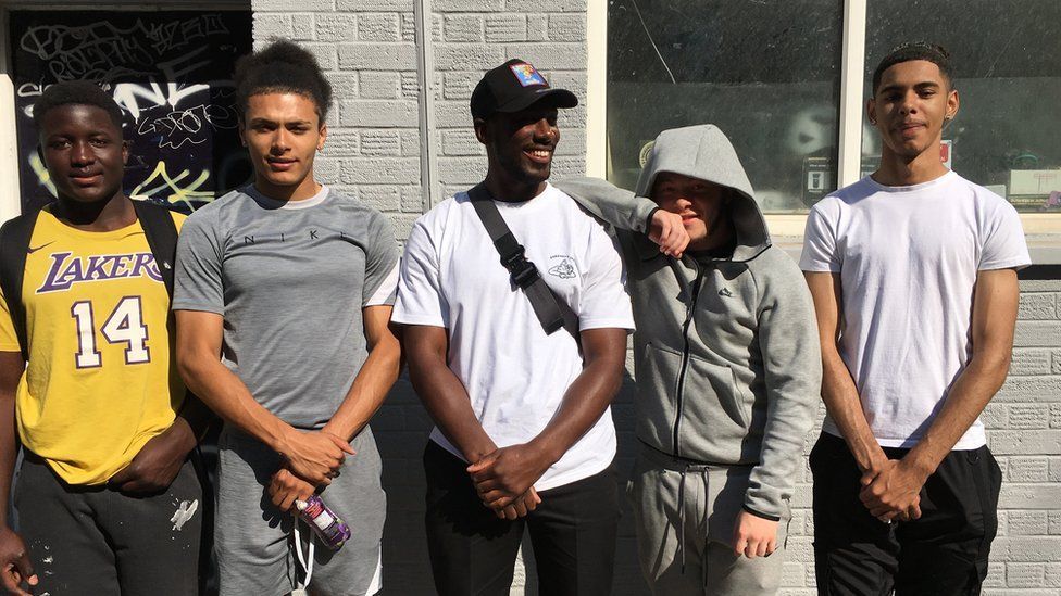 Anton Brown (centre) with some of the young people he mentors