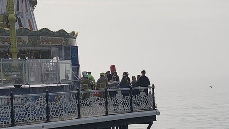 Emergency services at the scene at the end of the pier