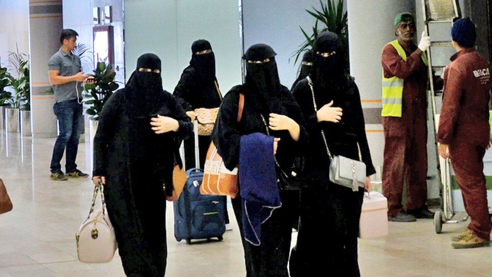 A picture taken during a guided tour with the Saudi military on 13 June 2019 shows Saudi women arriving at Abha airport in the popular mountain resort of the same name in the southwest of Saudi Arabia