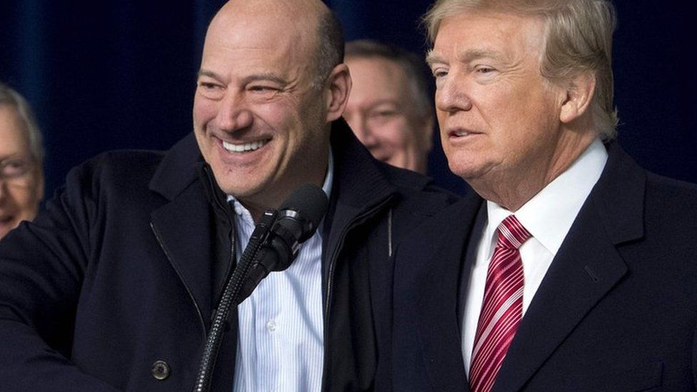 US President Donald Trump shakes hands with Gary Cohn, Director of the National Economic Council, on January 6, 2018