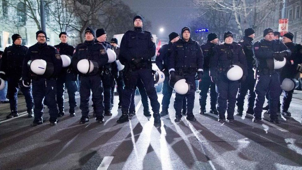 Police patrol the streets of Vienna during protests against the Academics Ball. Photo: 26 January 2018