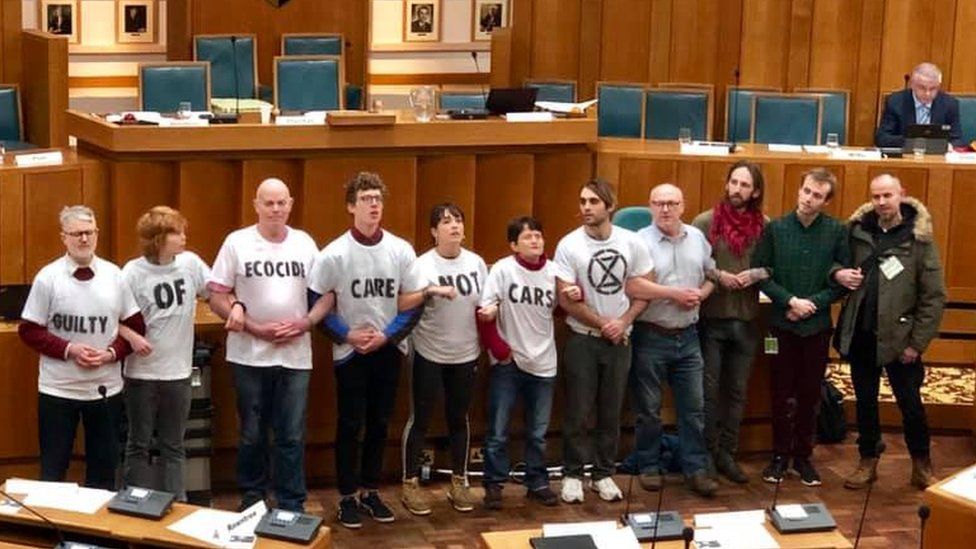 Climate change protestor guilty of Norfolk council meeting disruption ...