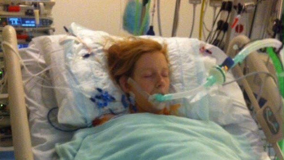 A photo of Becky in hospital after her operation