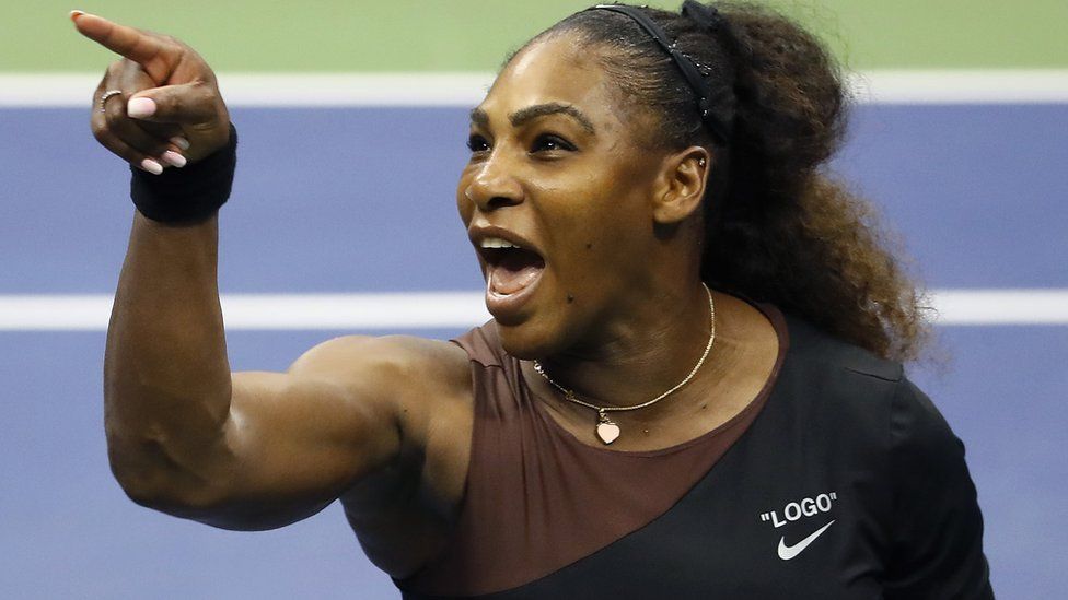 Serena Williams shouting on a tennis court