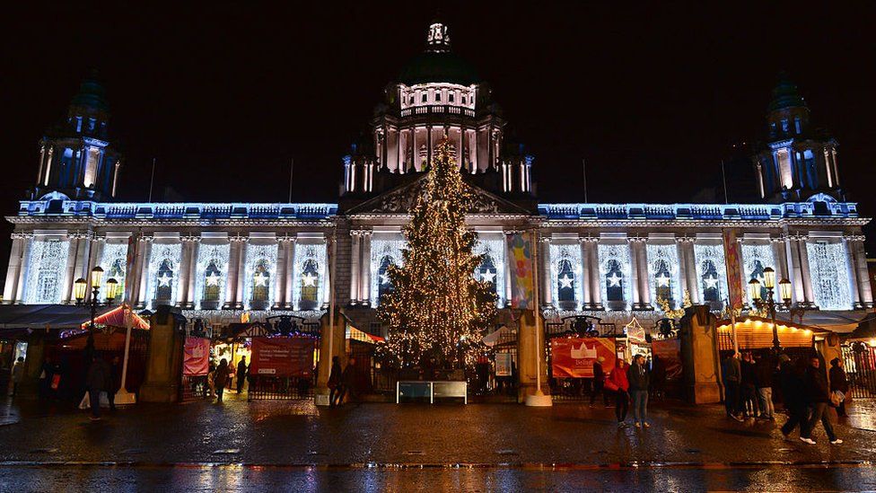 Belfast City Hall lit up for Christmas (archive photo)