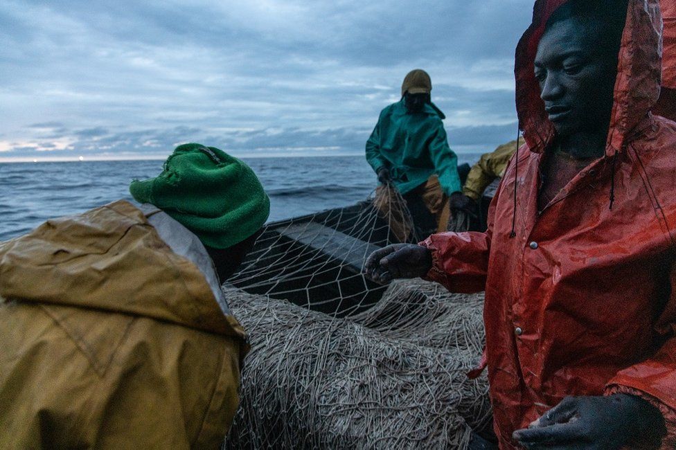 Fishermen at sea