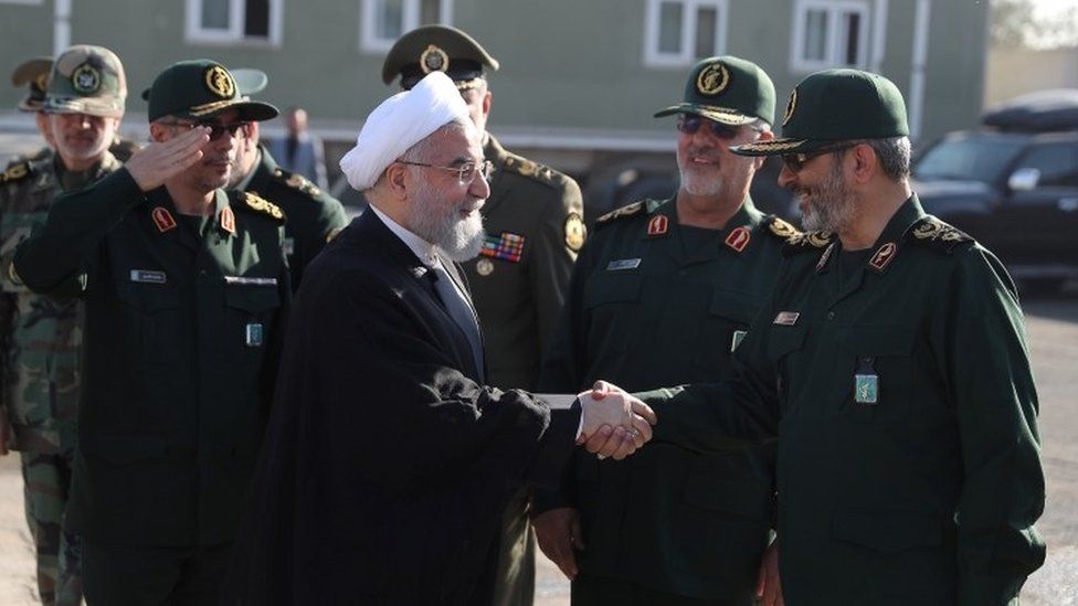 Iranian President Hassan Rouhani attends an armed forces parade in Tehran