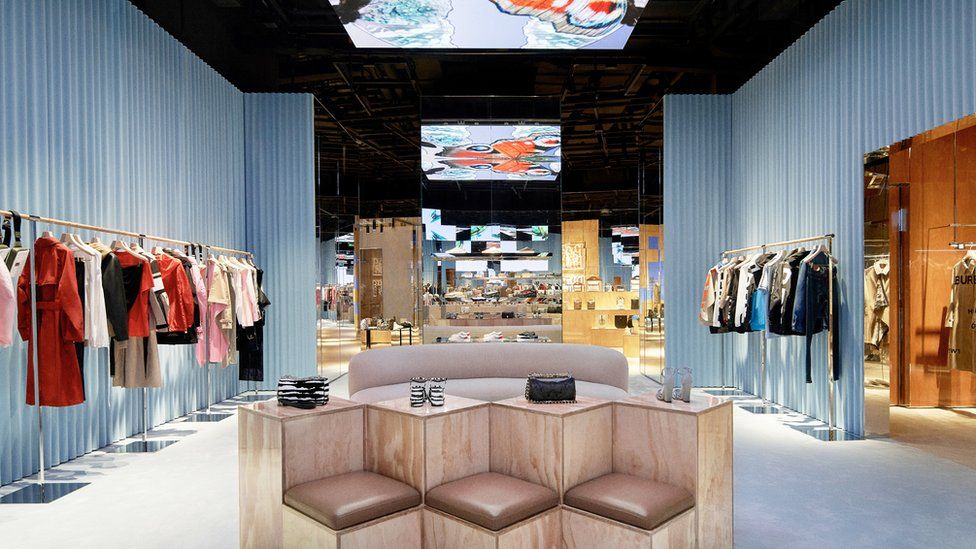 Burberry has teamed up with China's tech giant Tencent to launch a luxury concept store using social media interactions.