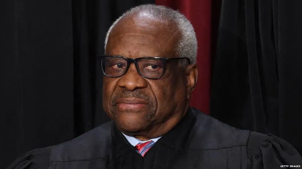 Associate Justice Clarence Thomas accepted luxury vacations from a billionaire and sees nothing improper about it. _129305984_clarencethomas.jpg