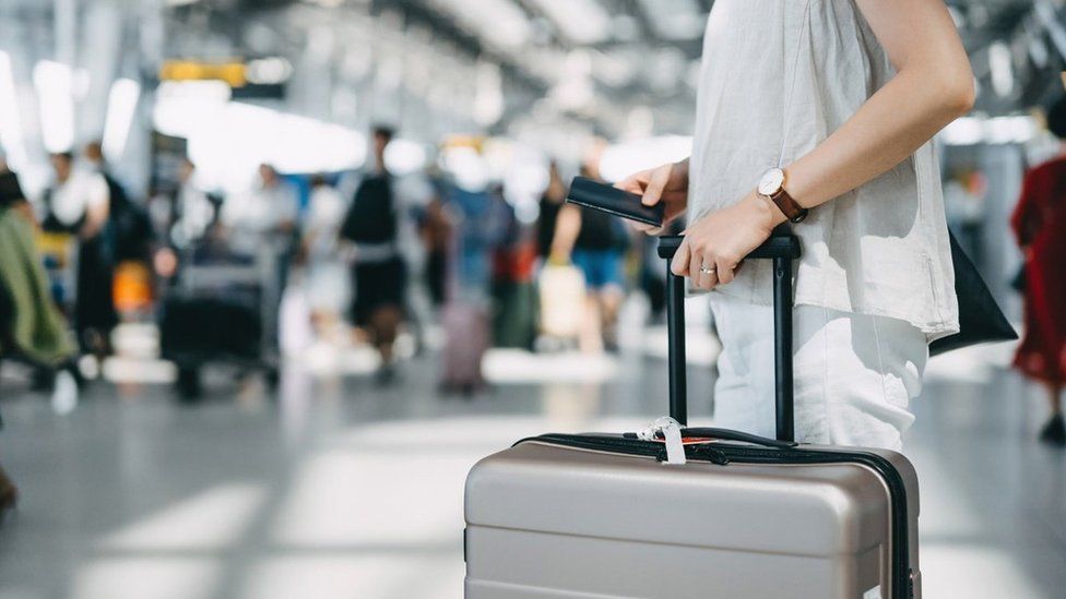 Woman going on plane