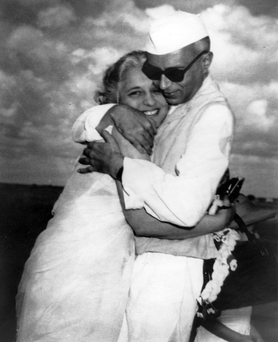 Mr Nehru and his sister Vijayalaxmi Pandit hug at the Delhi airport