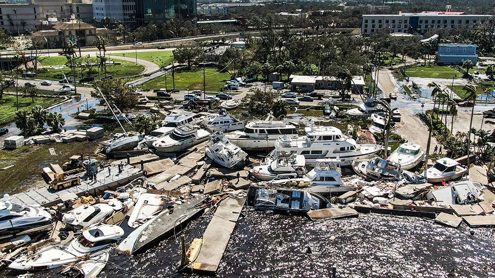 Boats washed ashore near the waterfront in Fort Myers, Florida