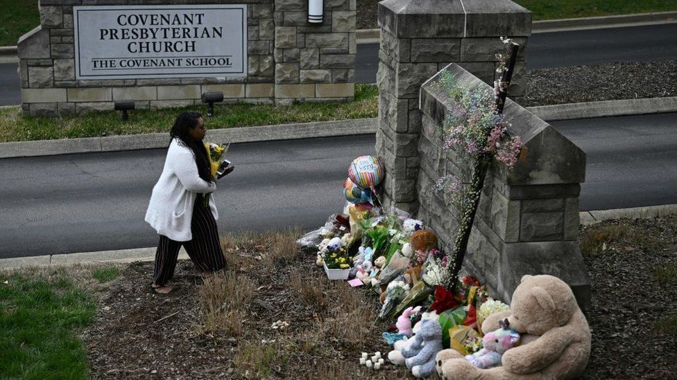 A woman mourns at Covenant School in Nashville