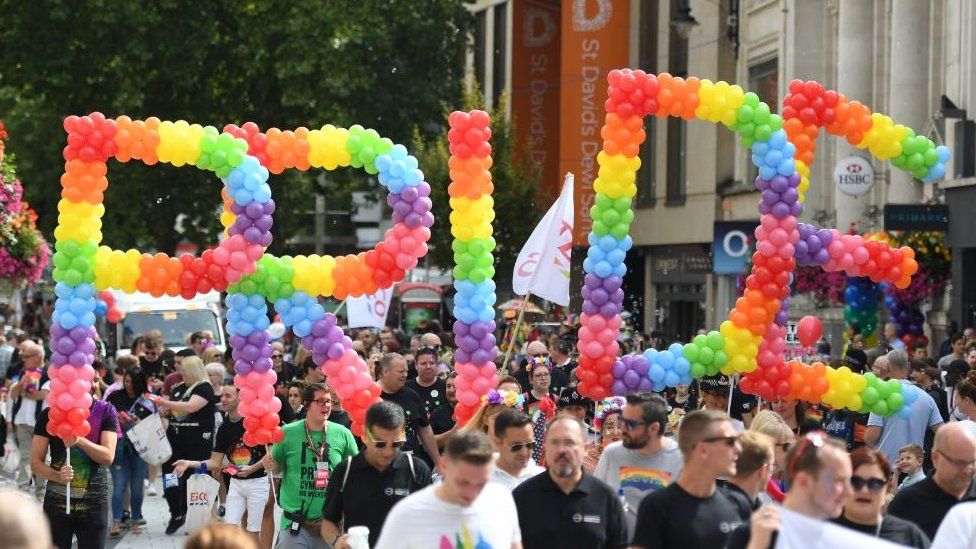Thousands of people march through the streets of Cardiff city centre celebrating Pride Cymru