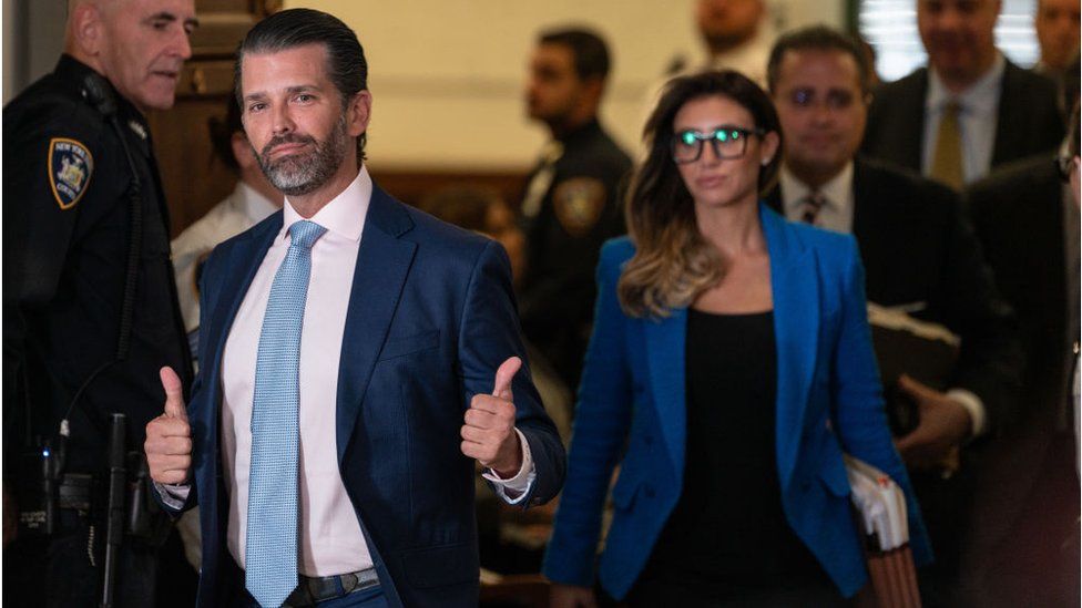 Trump Jr flashes thumbs up