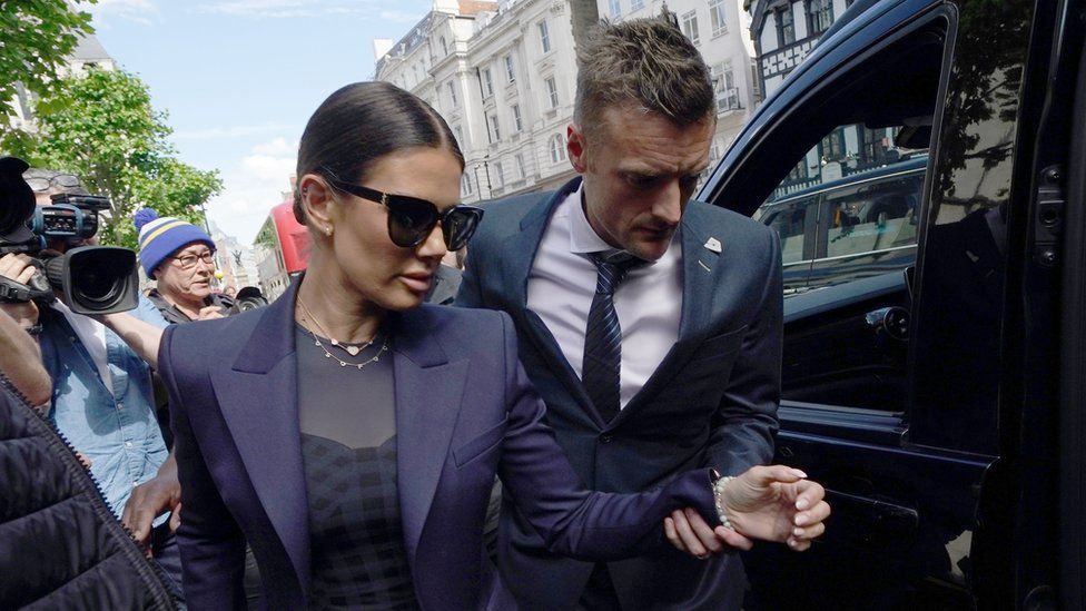 Jamie and Rebekah Vardy outside the High Court