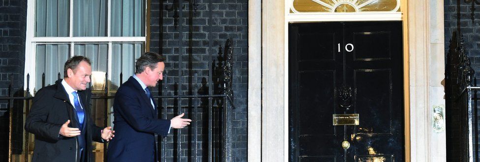 Donald Tusk and David Cameron approaching the door of 10 Downing Street