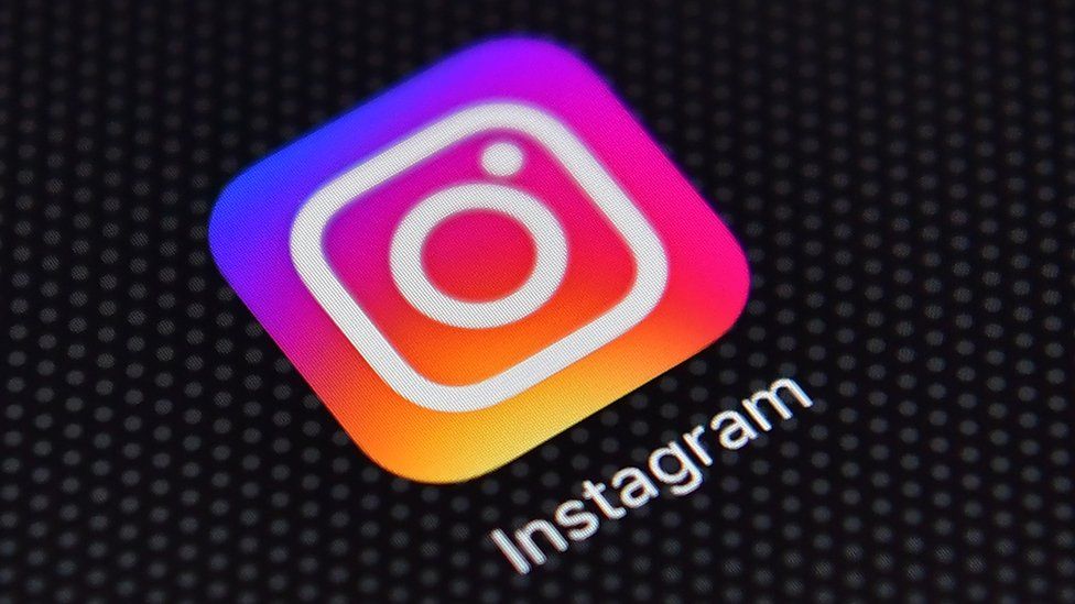 The multi-coloured Instagram logo as seen on a smartphone screen