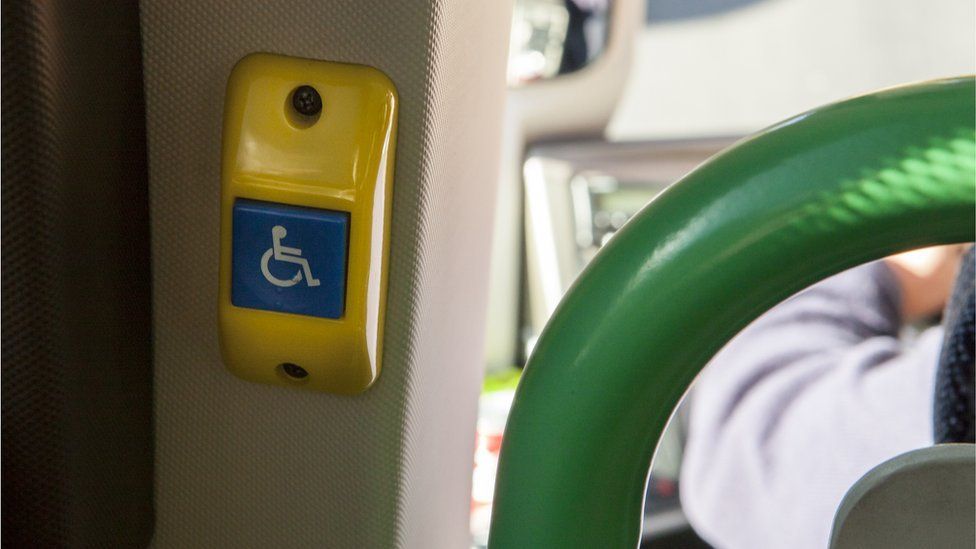 A disabled button on a bus