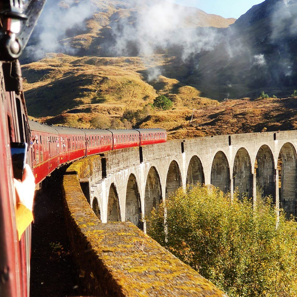 The Jacobite Express crossing the Glenfinnan Viaduct at Glenfinnan
