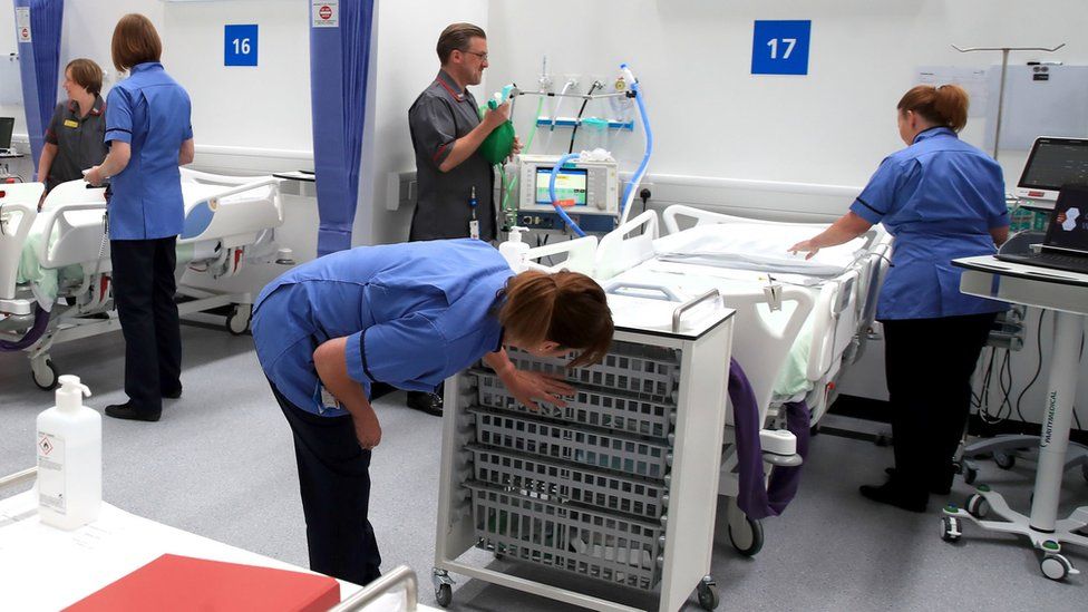 Staff preparing bays at the NHS Nightingale North East hospital in Sunderland
