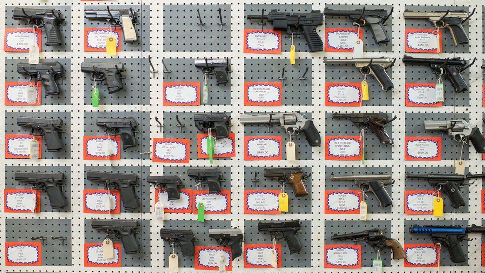 Guns are on display at Roseburg Gun Shop in Roseburg, Oregon, on 2 October 2015