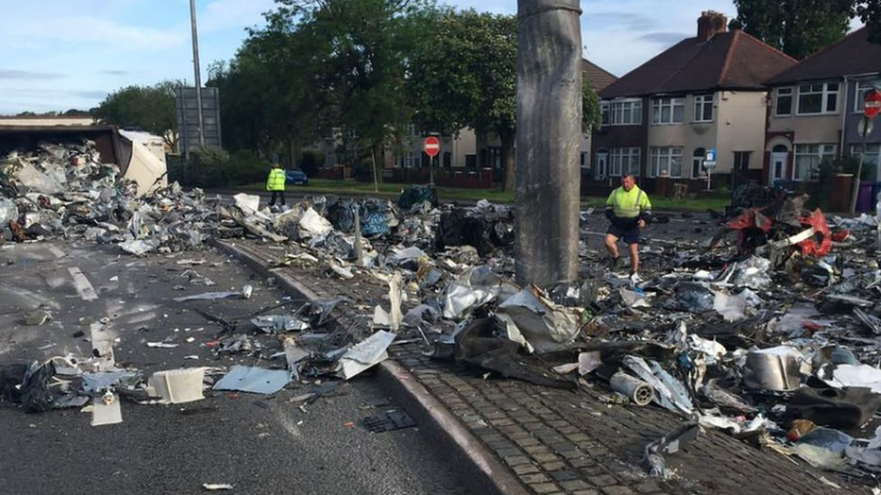 Lorry overturns in Liverpool and spills scrap metal BBC News