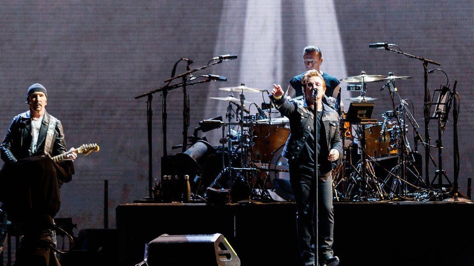 The Edge, Bono and Larry Mullen Jr. of rock band U2 perform on stage during their 'The Joshua Tree World Tour' opener at BC Place on May 12, 2017 in Vancouver, Canada