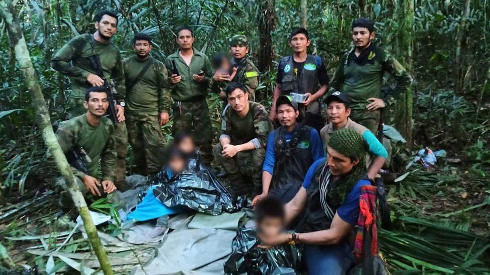 Colombian military soldiers pose for a photo after the rescue of child survivors from a Cessna 206 plane that crashed on May 1 in the jungles of Caqueta, in limits between Caqueta and Guaviare, in this handout photo released June 9, 2023.