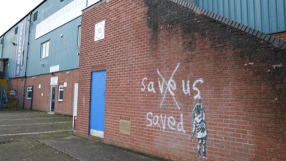 Graffiti outside Gigg Lane in Bury