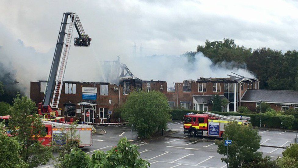 Weybridge Community Hospital engulfed by fire - BBC News