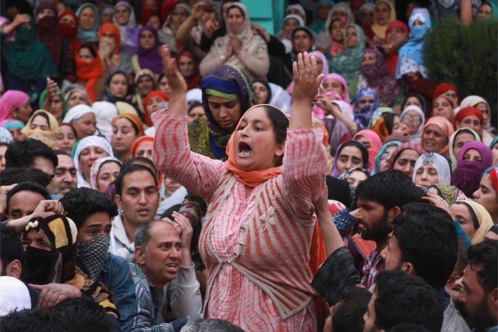 Kashmiri Muslim women mourn during the funeral procession of an Assistant Professor turned militant Dr. Muhammad Rafi Bhat during his funeral procession in Ganderbal, some 35 kilometers northwest of Srinagar, the summer capital of Indian Kashmir, 06 May 2018