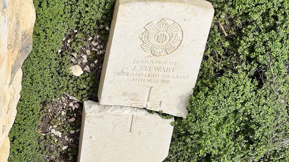 Desecrated grave of British soldier Private J Stewart at the Mount Zion cemetery in Jerusalem