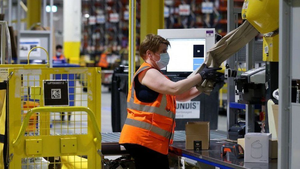 Worker in an Amazon warehouse.