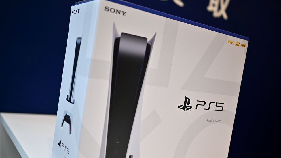 The PlayStation 5 retail box is seen on a table in this photograph