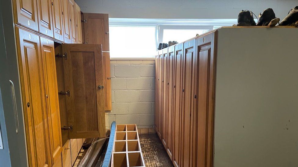Changing rooms damaged by flood water