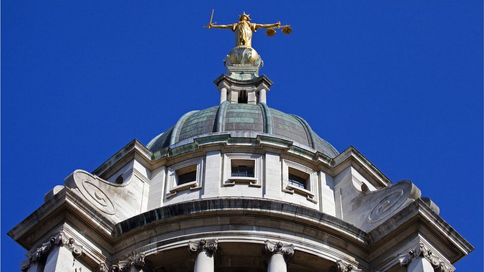 Lady Justice statue on top of the Old Bailey building