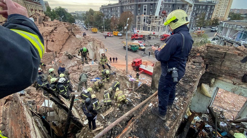 Emergency services work at the site of a missile strike in Kharkiv, north-eastern Ukraine. Photo: 6 October 2023