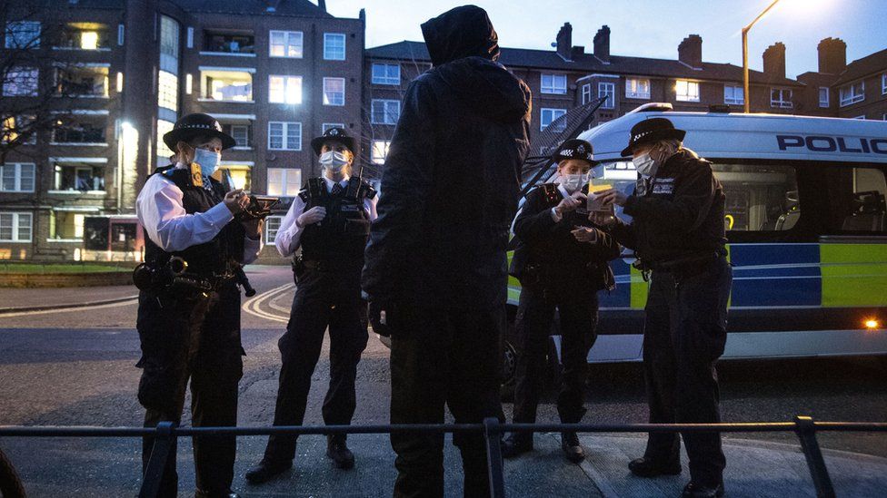 Police talking to a suspect following a stop and search in Walworth, London