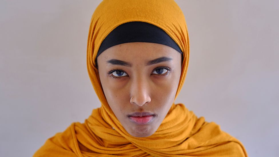 Young woman staring into the camera